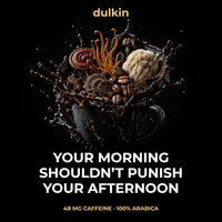 A splash of Dulkin coffee on a dark background